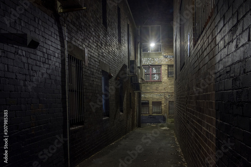 Empty old alley ay night