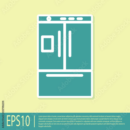 Green Refrigerator icon isolated on yellow background. Fridge freezer refrigerator. Household tech and appliances.  Vector Illustration