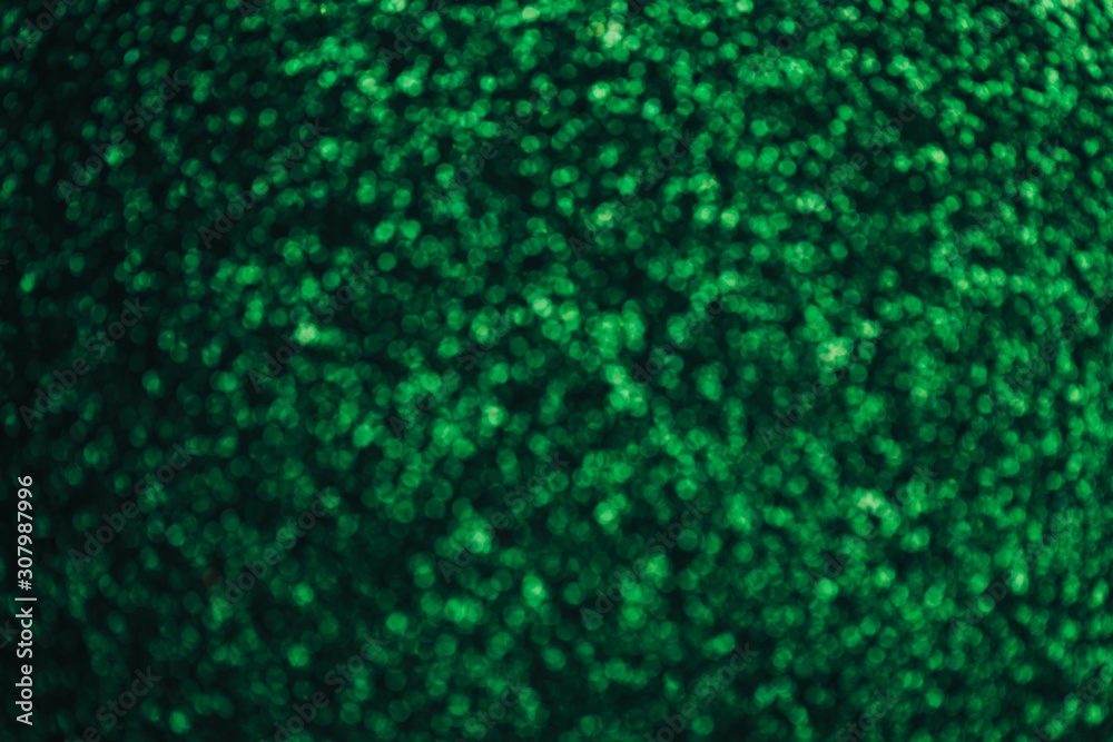 defocused green sparkles, lights blurred background, bokeh. defocused green sparkles, lights blurred background, bokeh.