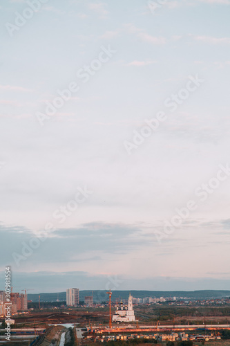 Screensaver and background for design. Morning panorama of the sky with the Church.