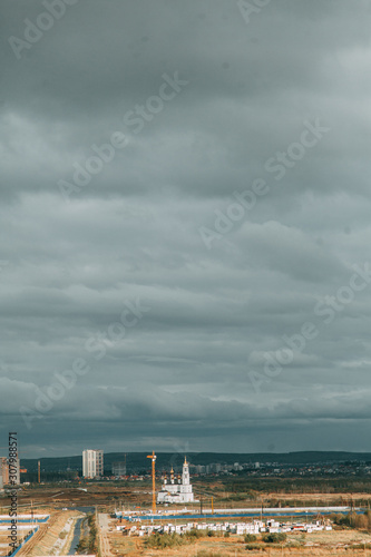 Screensaver and background for design. Morning panorama of the sky with the Church.