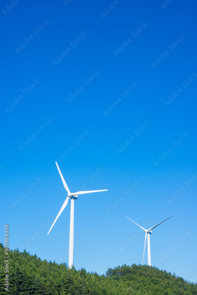 Wind turbine farm power generator on the mountain. 