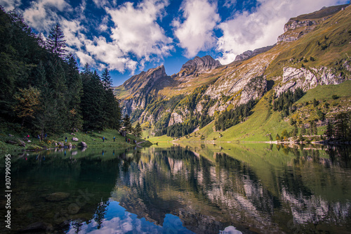 wide angle landscape of Seealpsee in Switzerland