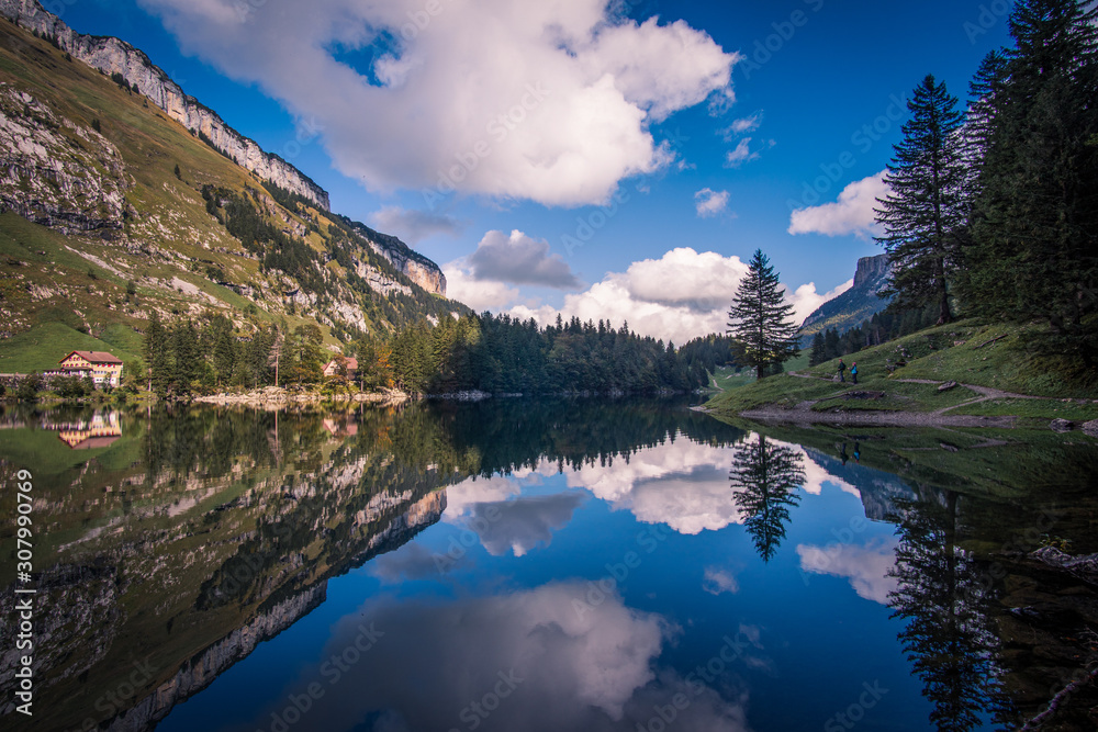wide angle landscape of Seealpsee in Switzerland