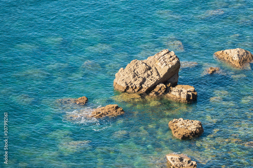 rock and sea, turquoise water
