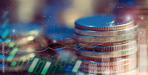 Financial investment concept, Double exposure of city night and stack of coins for finance investor, Forex trading candlestick chart, Cryptocurrency  Digital economy. background for invest