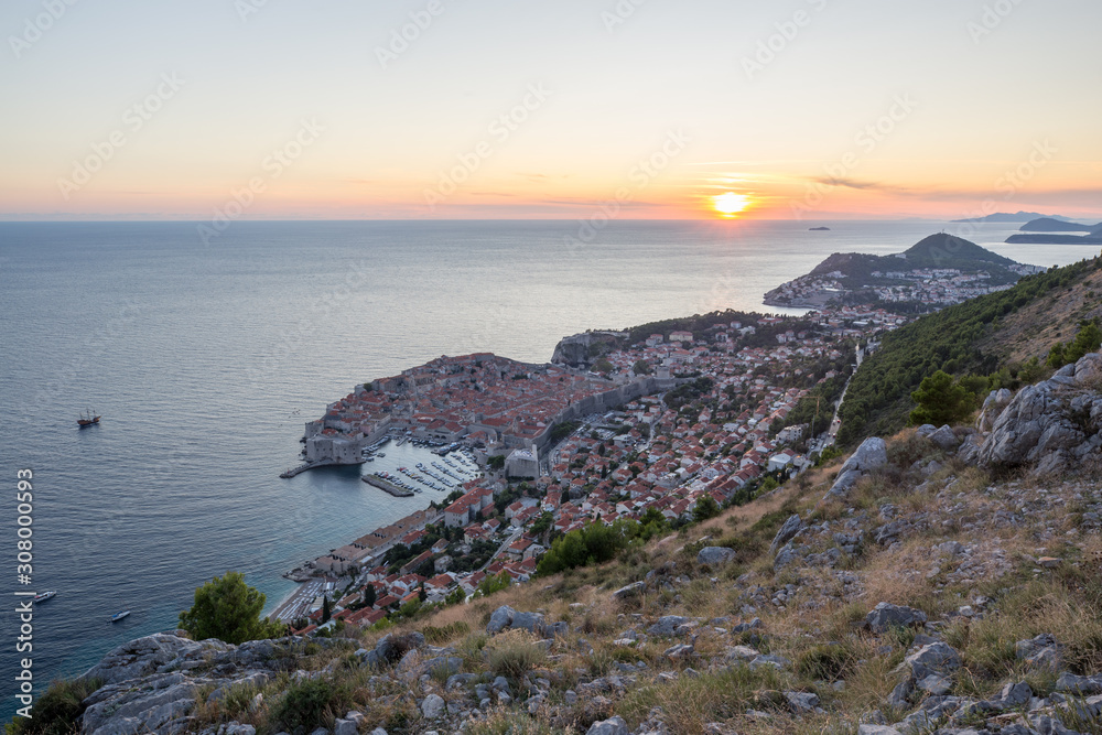 Aerial view of the sunset and night view with ancient buildings in Dubrovnik, Croatia