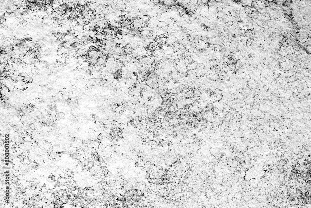 Texture of a concrete wall with cracks and scratches which can be used as a background Texture of a concrete wall with cracks and scratches which can be used as a background