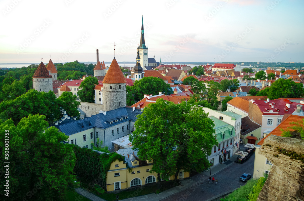 Aerial cityscape with Medieval Old Town, St. Olaf Baptist Church and Tallinn City Wall, Tallinn, Estonia