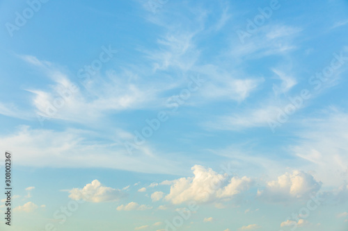 photo of blue sky and white clouds or cloudscape.