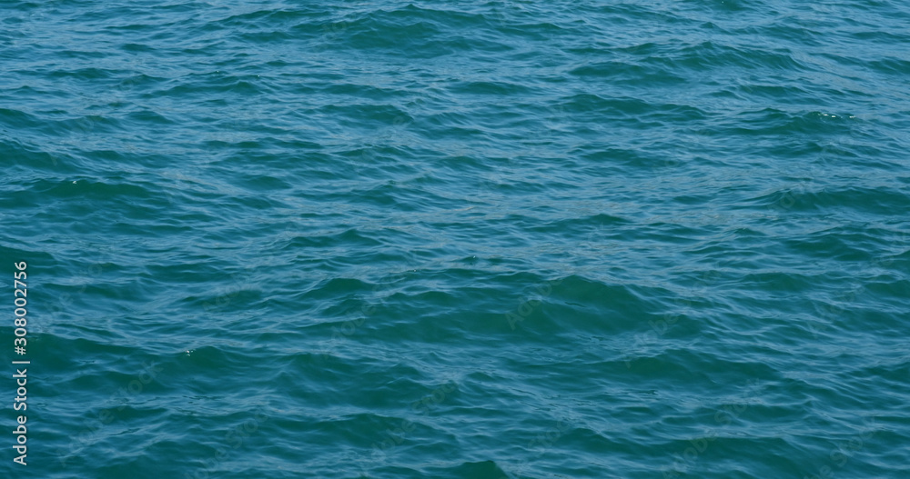 Sea surface water texture in blue