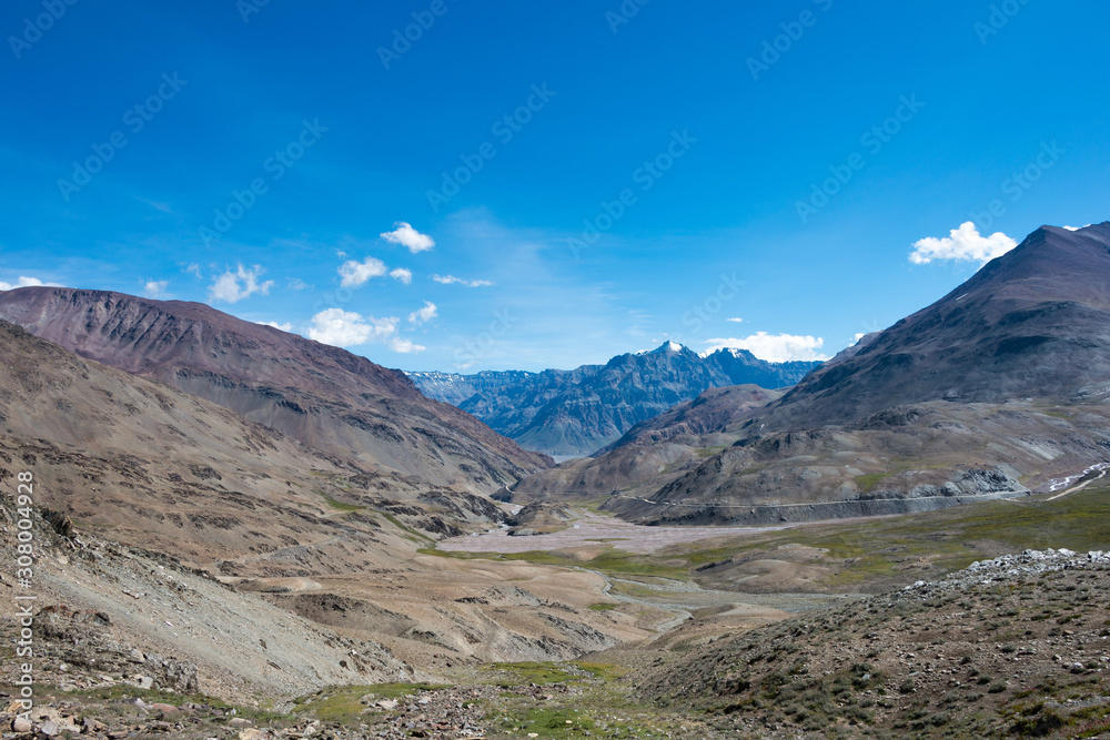 Himachal Pradesh, India - Sep 03 2019 - Kunzum Pass (Kunzum La) - Chandra Taal (Moon Lake) Trekking course in Lahaul and Spiti, Himachal Pradesh, India. Himachal Pradesh, India - Sep 03 2019 - Kunzum Pass (Kunzum La) - Chandra Taal (Moon Lake) Trekking course in Lahaul and Spiti, Himachal Pradesh, India.