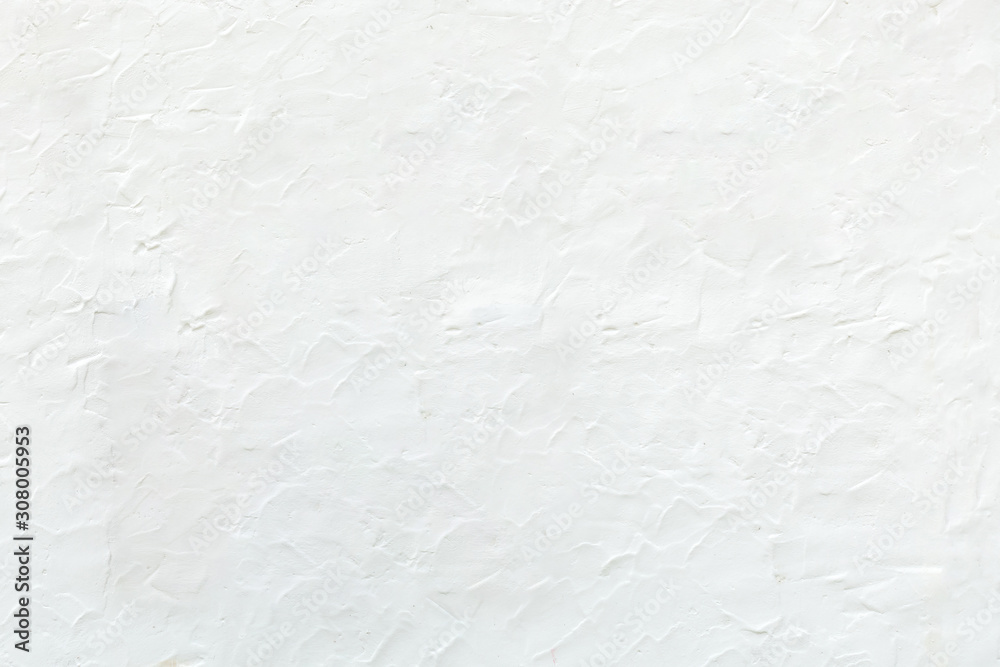 White concrete wall background textured for backdrop or abstract background. White concrete wall background textured for backdrop or abstract background.