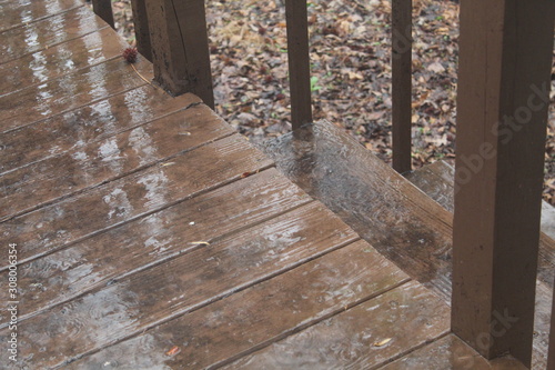 Rain and water on a wooden deck © Thomas Balevre Jr.