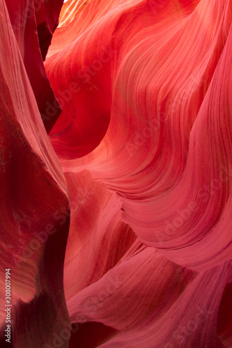 Antelope Canyon, Navajo land east of Page, Arizona. Perfect natural gradient, trendy vibrant colors. Tourist place. Beautiful canyon of red rocks, a creation of nature. Colorful layout for design.