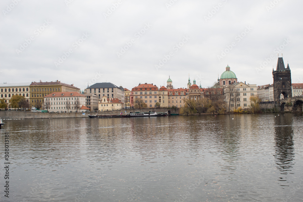  Cityscape of the Czech capital Prague and the Vltava river. View of Charles Bridge and Prague Castle on Christmas Eve.