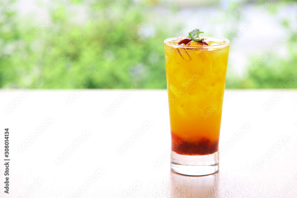 Fresh orange juice soda with strawberry syrup Fresh orange juice soda with strawberry syrup