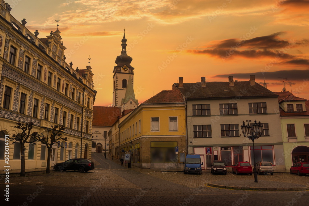 Main square of czech city of Pisek in sunny evening. Czech Republic.