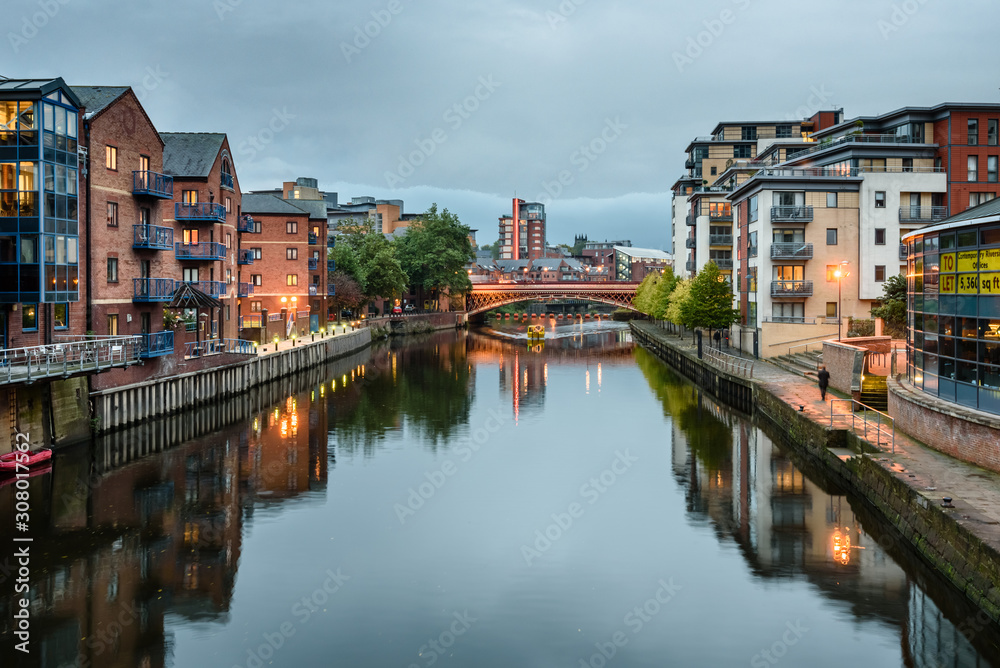 Apartments and other waterfront buildings along the River Aire, Leeds, West Yorkshire, England, UK