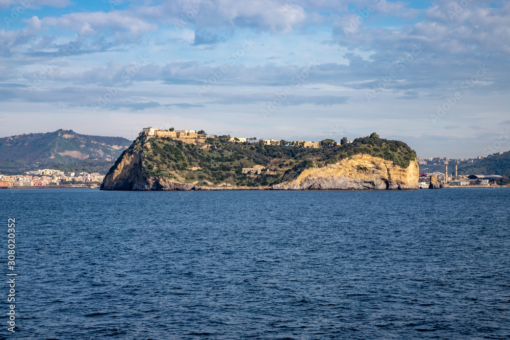 Phlegraean Islands, Naples, Campania, Italy: Isle of Nisida (volcanic islet) in the Gulf of Naples seen from the sea.