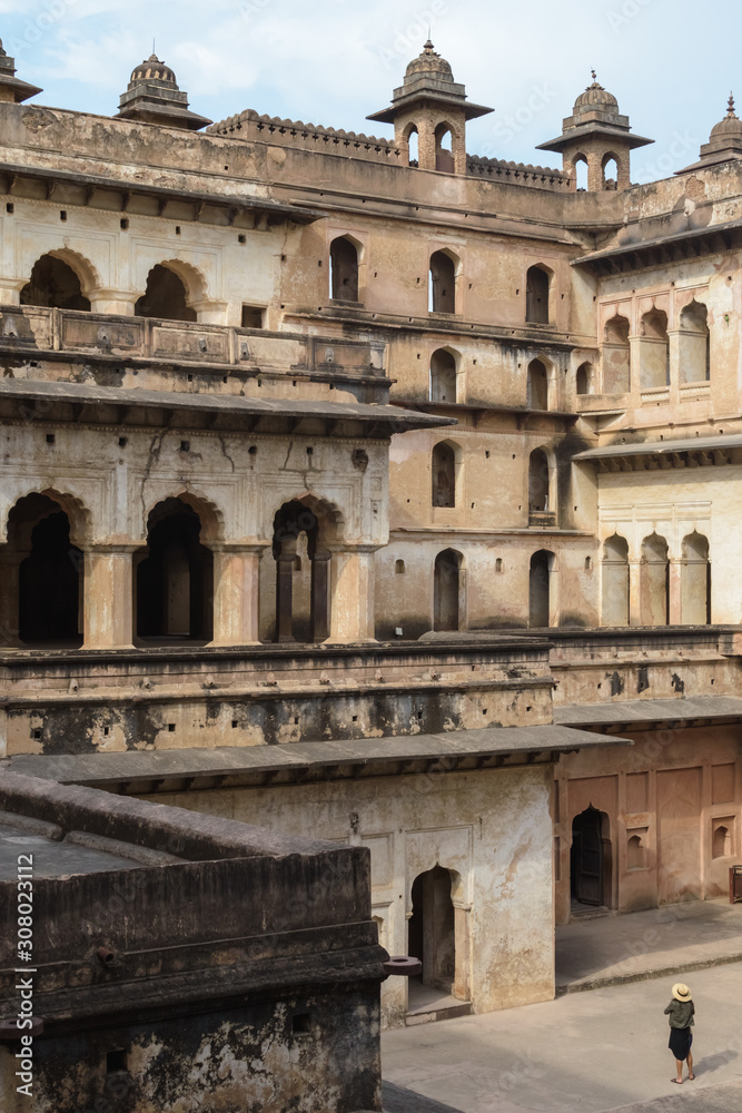 Orchha, Madhya Pradesh/India - March 14 2019: View of the multi-storeyed windowed walls of the facade of the Raja Mahal, the ancient palace of the Bundela Rajputs.