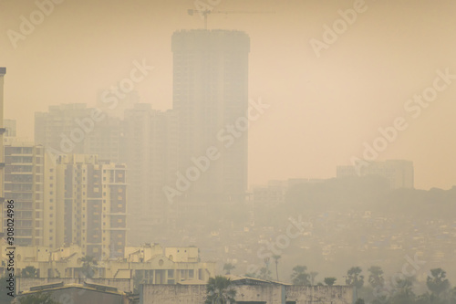 High air pollution and haze envelops the high rises in the suburb of Kandivali East in Mumbai.