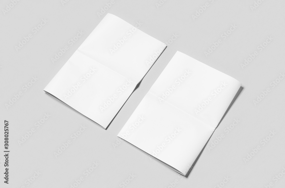 Blank newspaper mockup on a grey backgound. Blank newspaper mockup on a grey backgound.