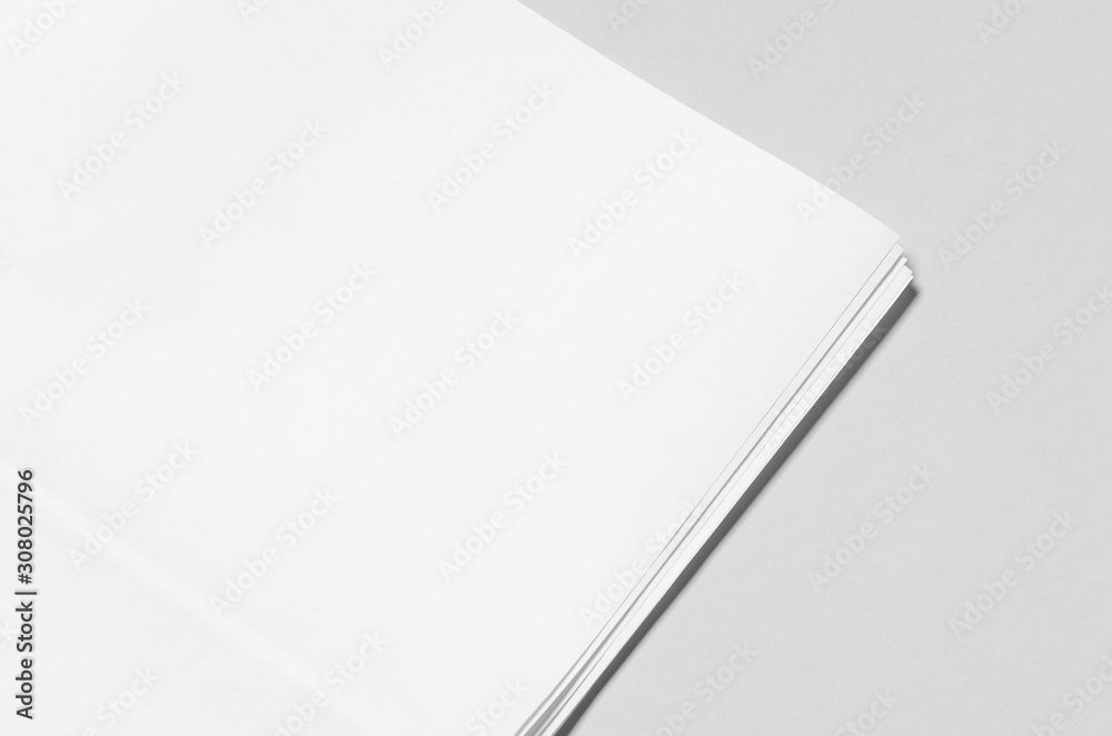 Blank newspaper mockup on a grey backgound. Blank newspaper mockup on a grey backgound.