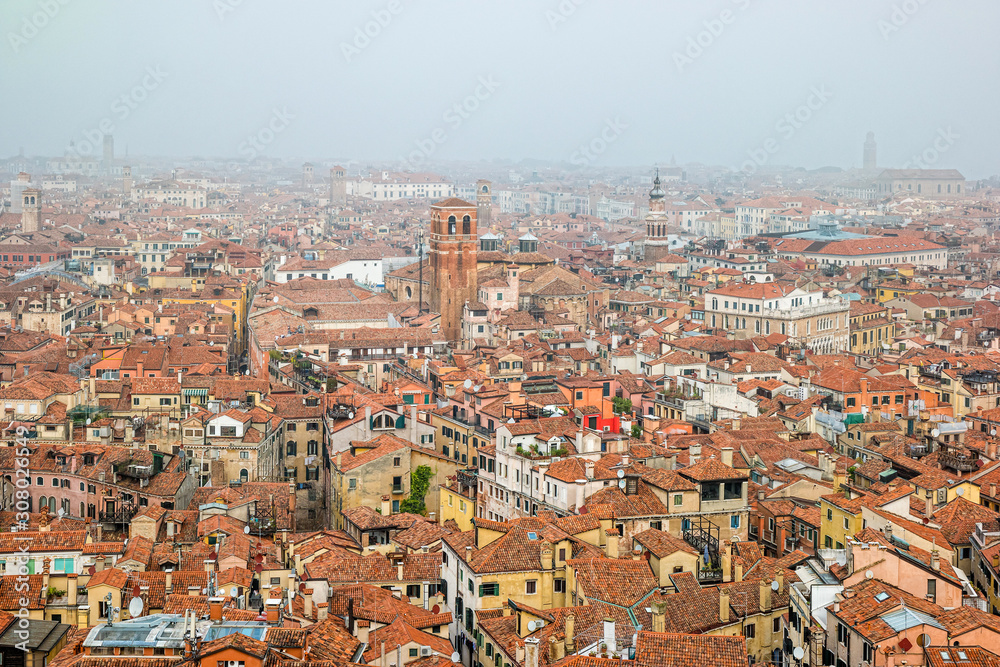 Foggy view from the top of Campanile di San Marco in the morning. Venice, Italy