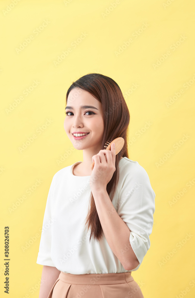 Concept of healthy good hair. Pretty beautiful charming woman with beaming smile