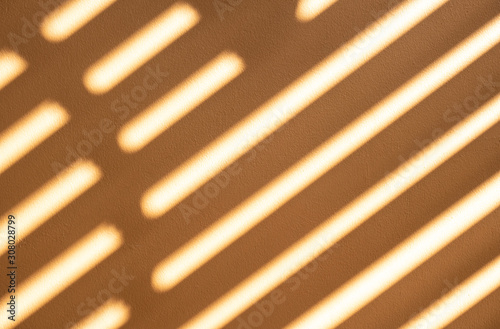 patterns of shadow on orange wall
