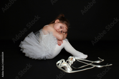 Melancholic girl in Swan Lake Ballerina photo