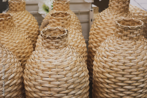 Rattan woven basket handmade. Decorative element. Rustic style.