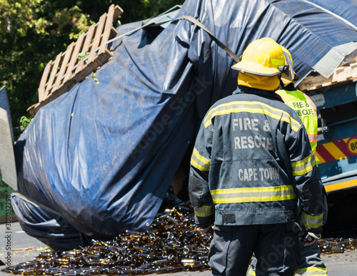 firemen at accident scene photo