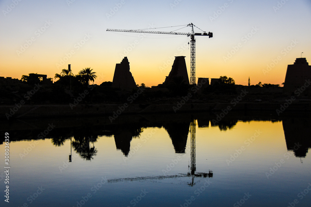 reflection of ancient buildings in water