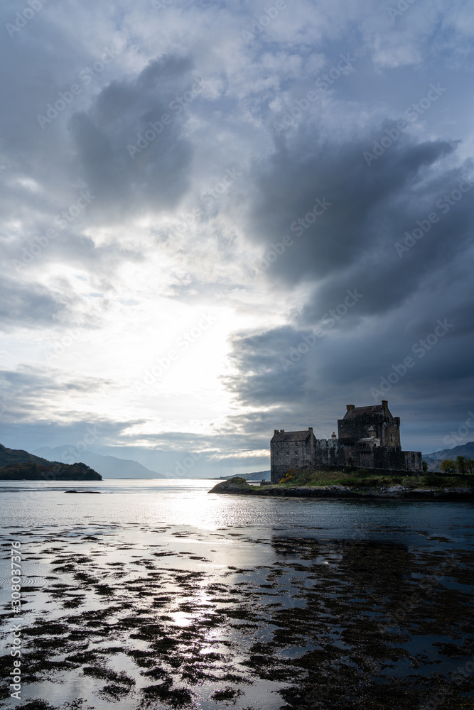 Eilean Donan castle vertical dramatic sky Eilean Donan castle vertical dramatic sky