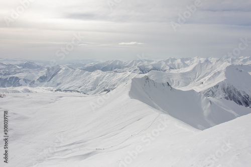 View from the snowy high mountain top © fesenko