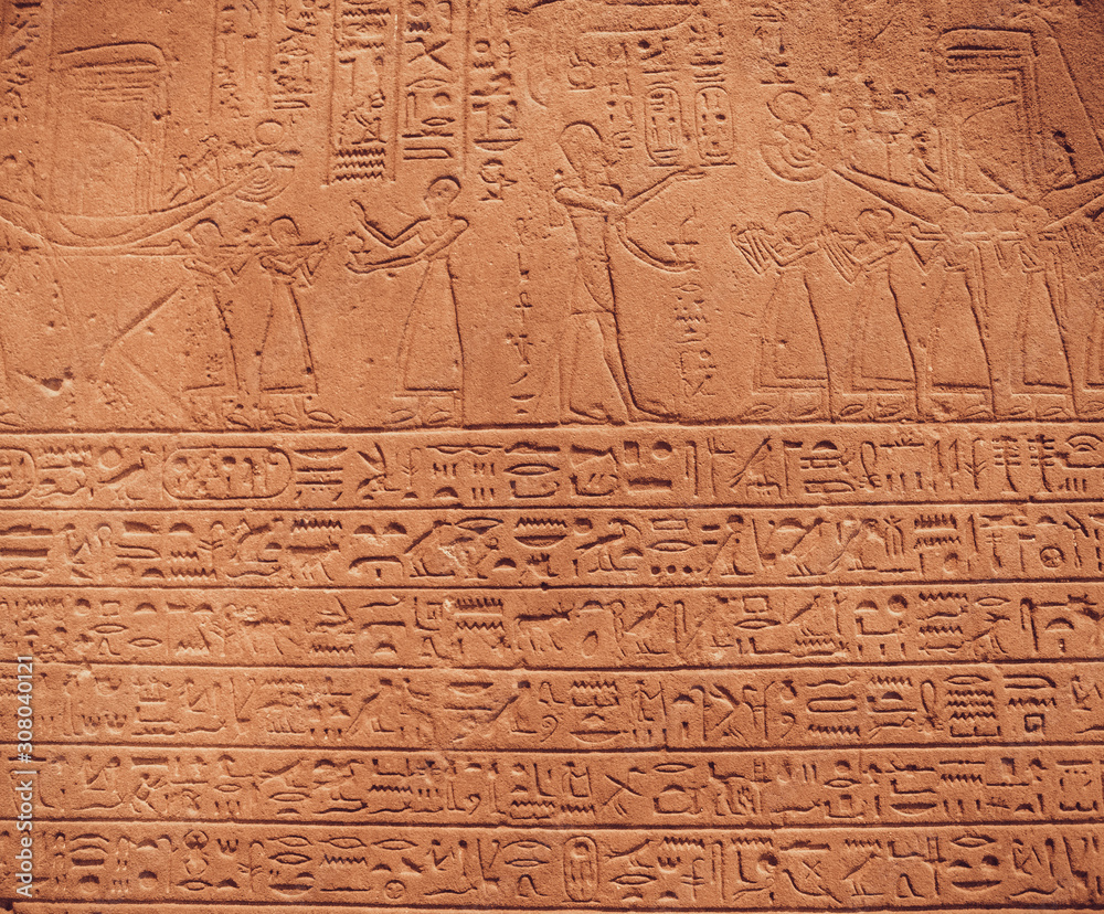 old egypt hieroglyphs carved on the stone