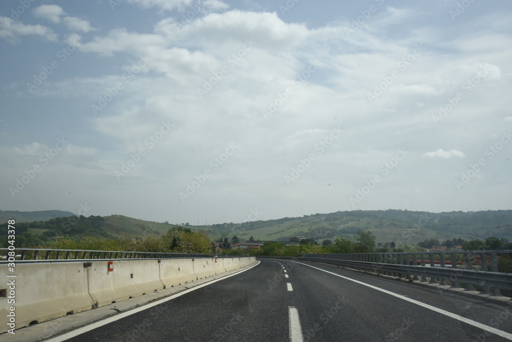 Fototapeta premium Highway Travel by Morning with Cloudy Sky