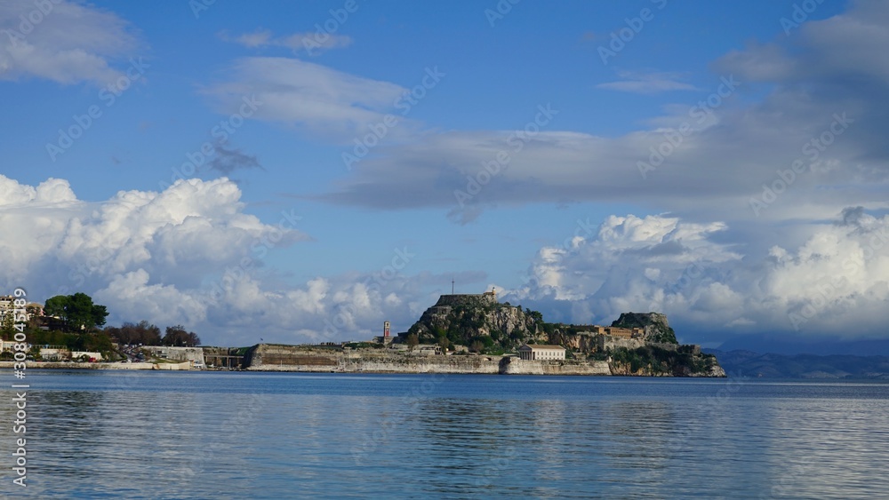 Greece, Corfu Island with clouds and sails sails Greece, Corfu Island with clouds and sails sails