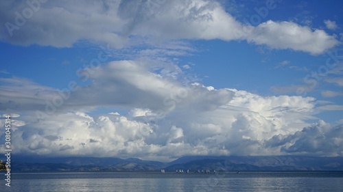 Greece, Corfu Island with clouds and sails                          sails © caglayanunalsumer