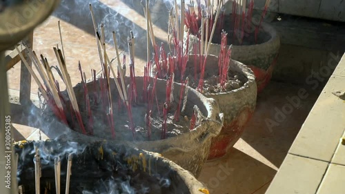 Burning  incense sticks. Incense for praying Buddha or Hindu gods to show respect, smoke from incense burning 