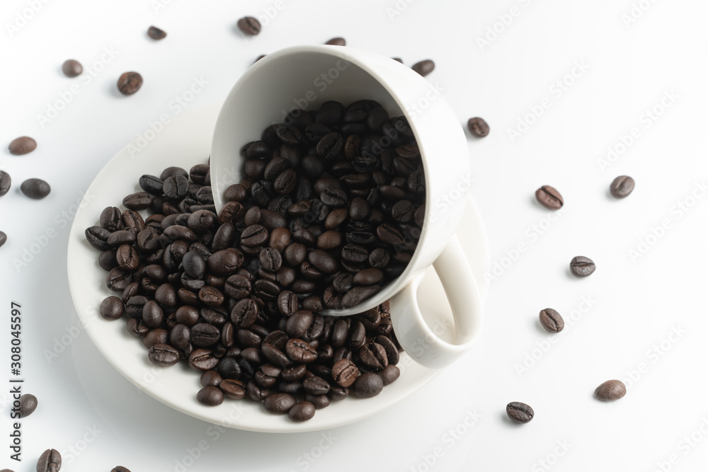 left top view black coffee bean in white cup with white background left top view black coffee bean in white cup with white background