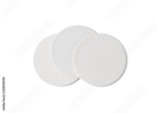 Photo of three blank beer coasters. Isolated on white background. Flat lay.