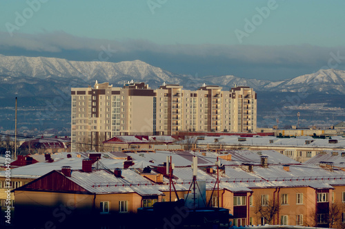 building and the mountains behind