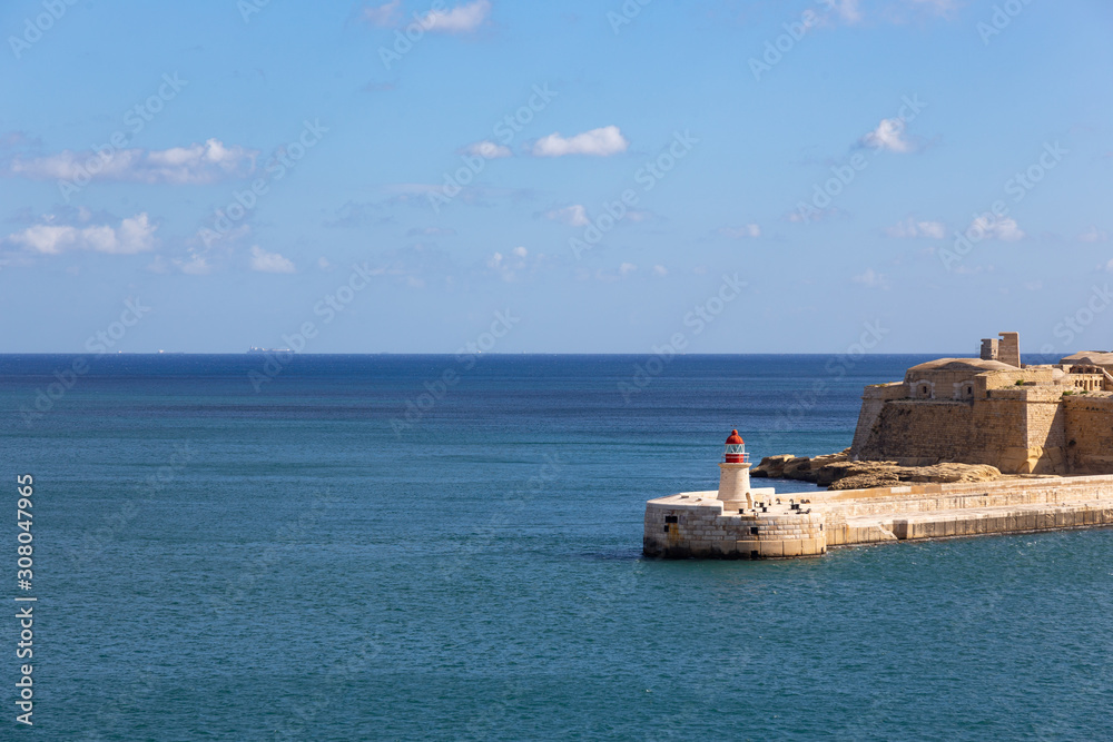 lighthouse in Valette Malta in the mediterranean sea
