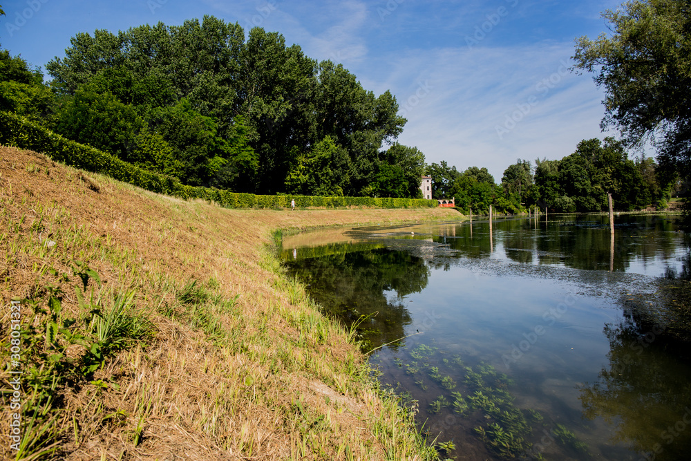 Colorful view on a lake with country path sunny day Colorful view on a lake with country path sunny day