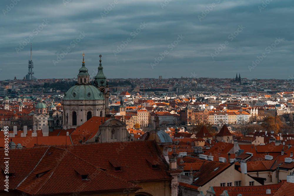 Beautiful View To The Cityscape of Prague, At Christmas Time and New Year. Sun ray on old town.