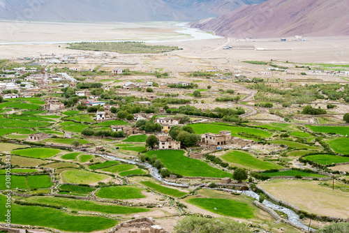 Ladakh, India - Jul 13 2019 - Nyoma Village view from Nyoma Monastery (Nyoma Gompa) in Nyoma, Ladakh, Jammu and Kashmir, India. photo