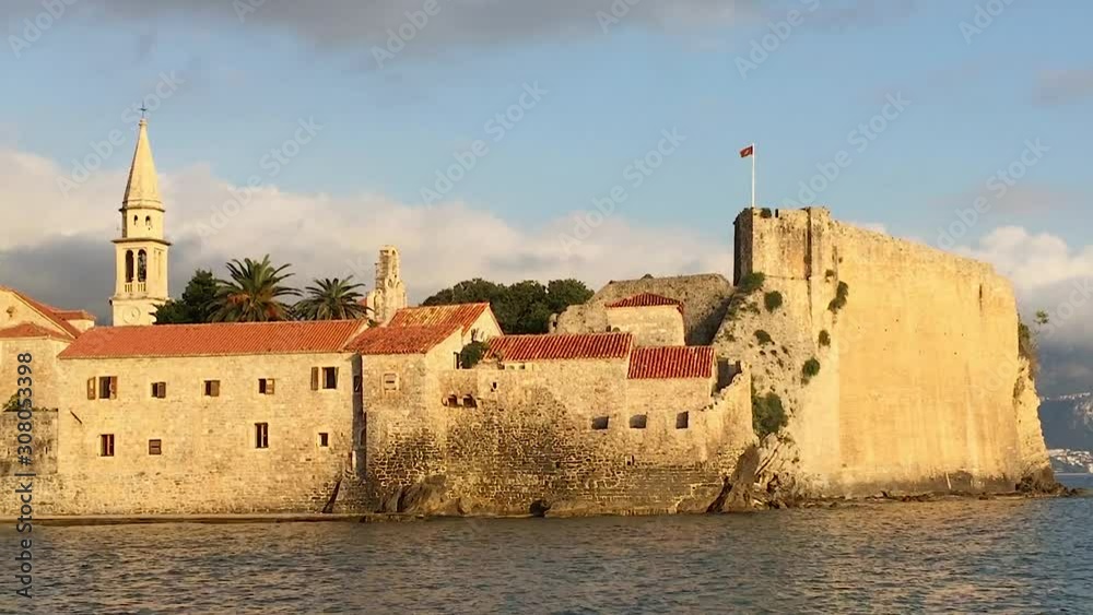 Summer view of Old Budva city at sunset, Montenegro Summer view of Old Budva city at sunset, Montenegro